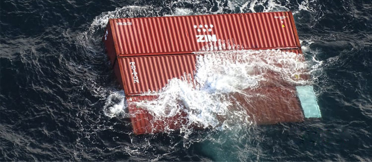 A fire broke out on a cargo ship after about 40 shipping containers fell overboard due to rough seas off the coast of Vancouver Island